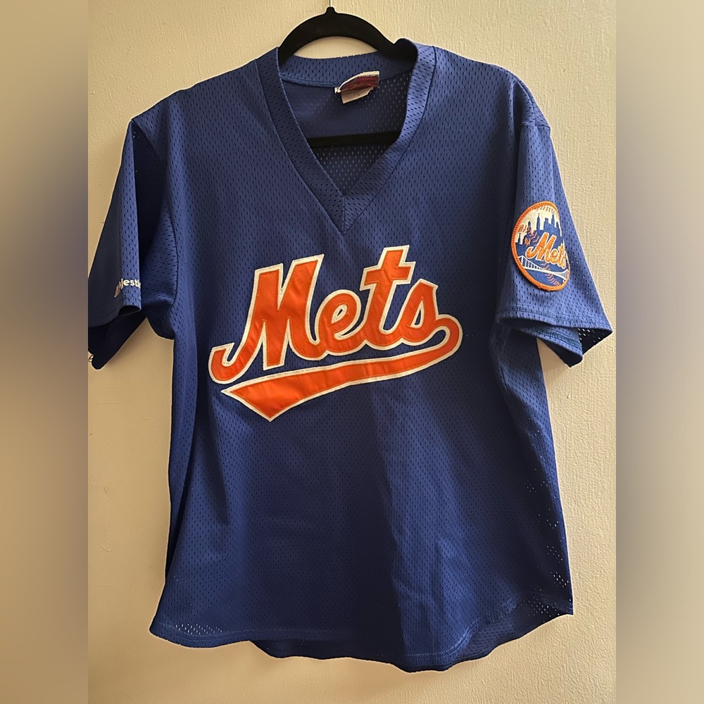 Vintage New York Mets baseball jersey in blue & orange